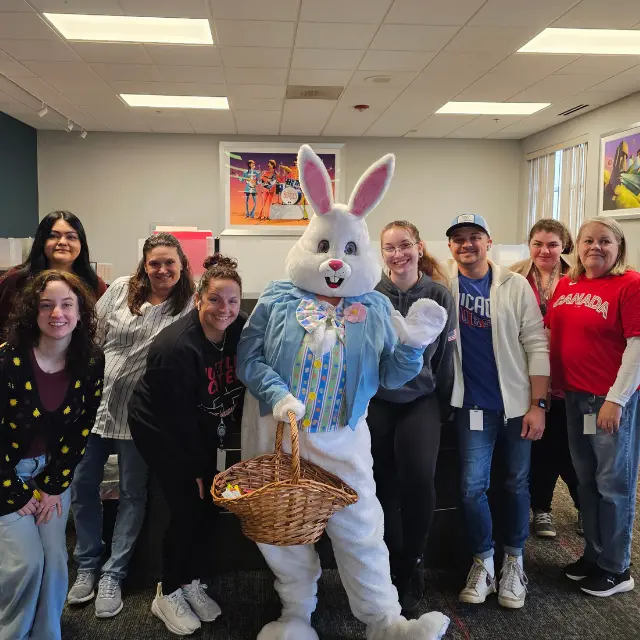 IW team celebrating Easter with the easter bunny